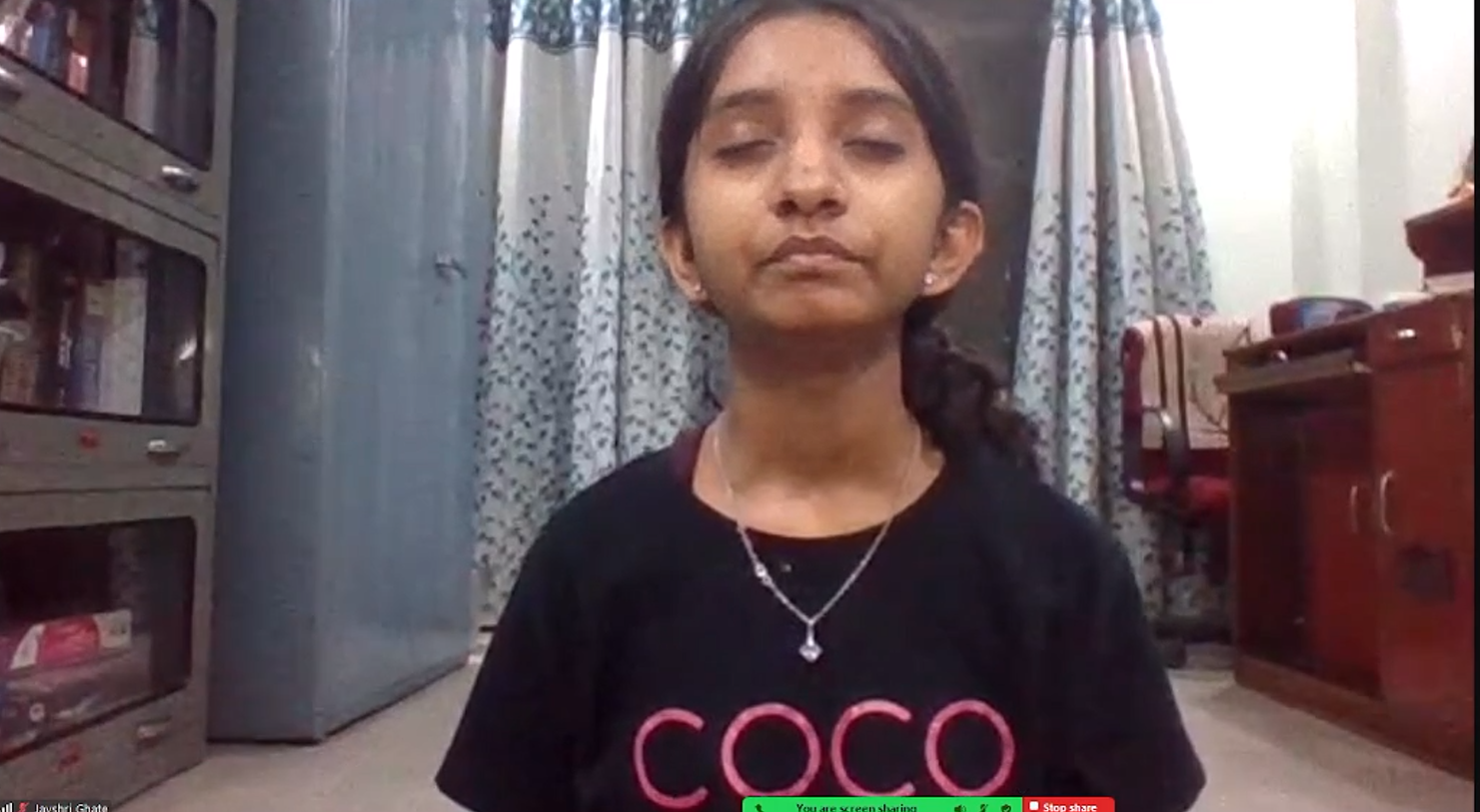 Child practicing yoga